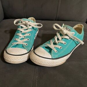 Teal Converse low tops